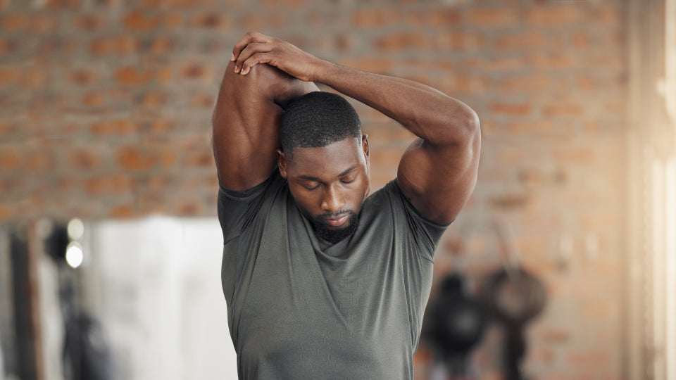 Man stretching to improve mobility