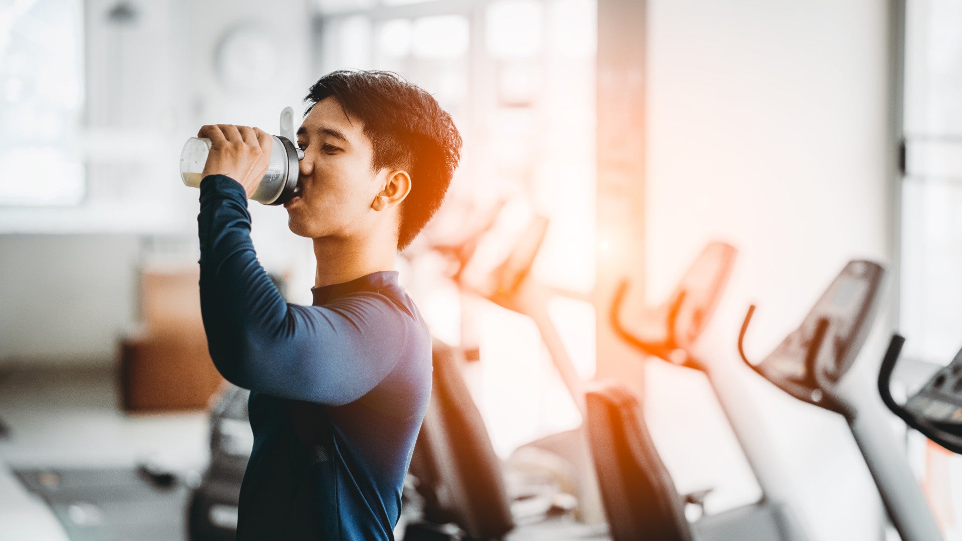 Man drinking pre workout supplement for weight loss
