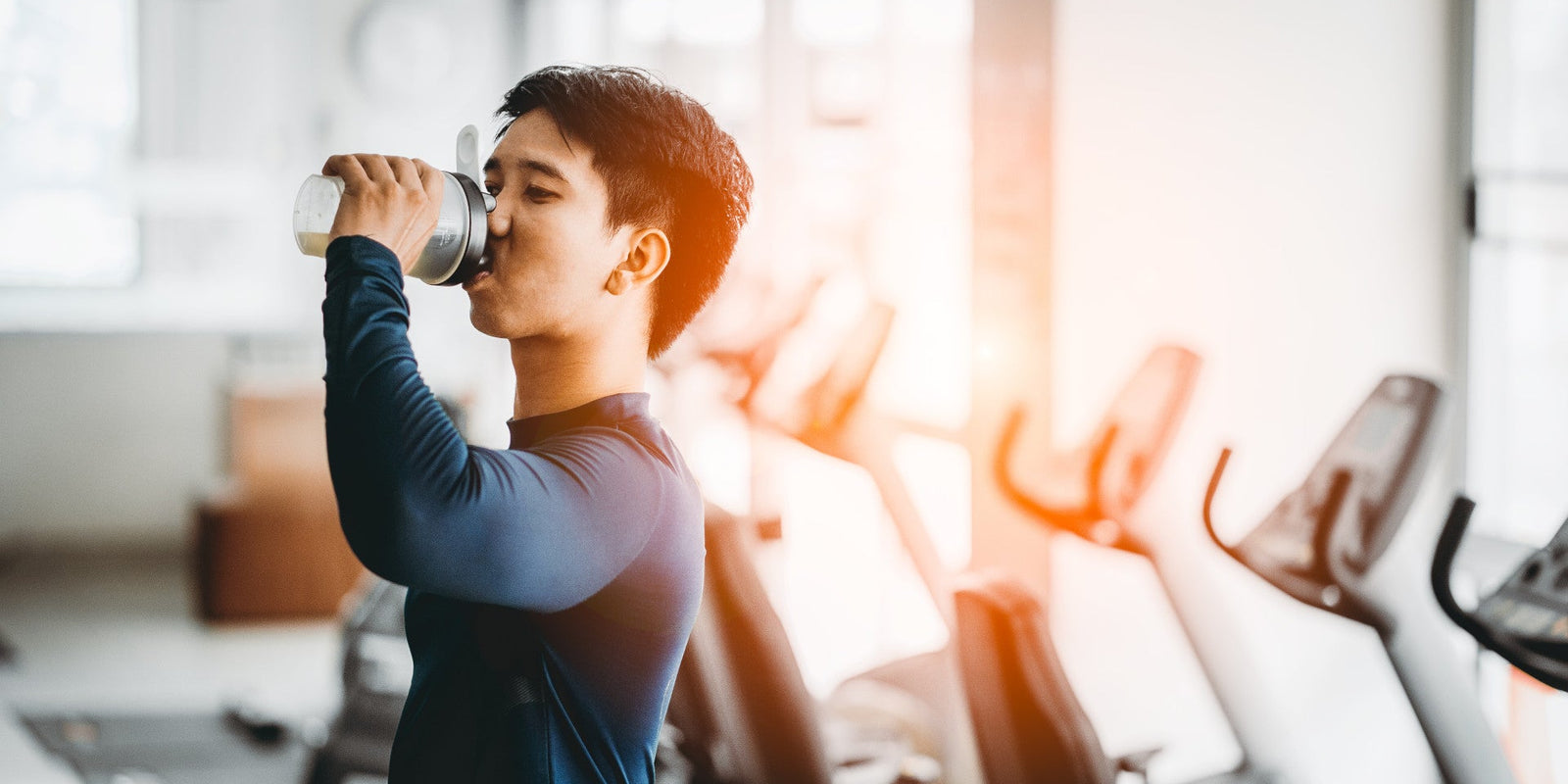 Man drinking pre workout supplement for weight loss